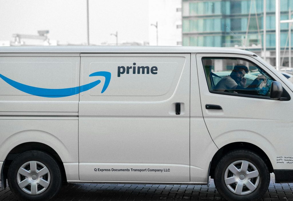 amazon delivery van parked in city
